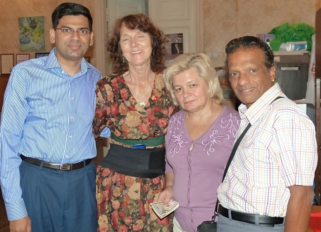 Dr. PK and colleagues with patients at a clinic